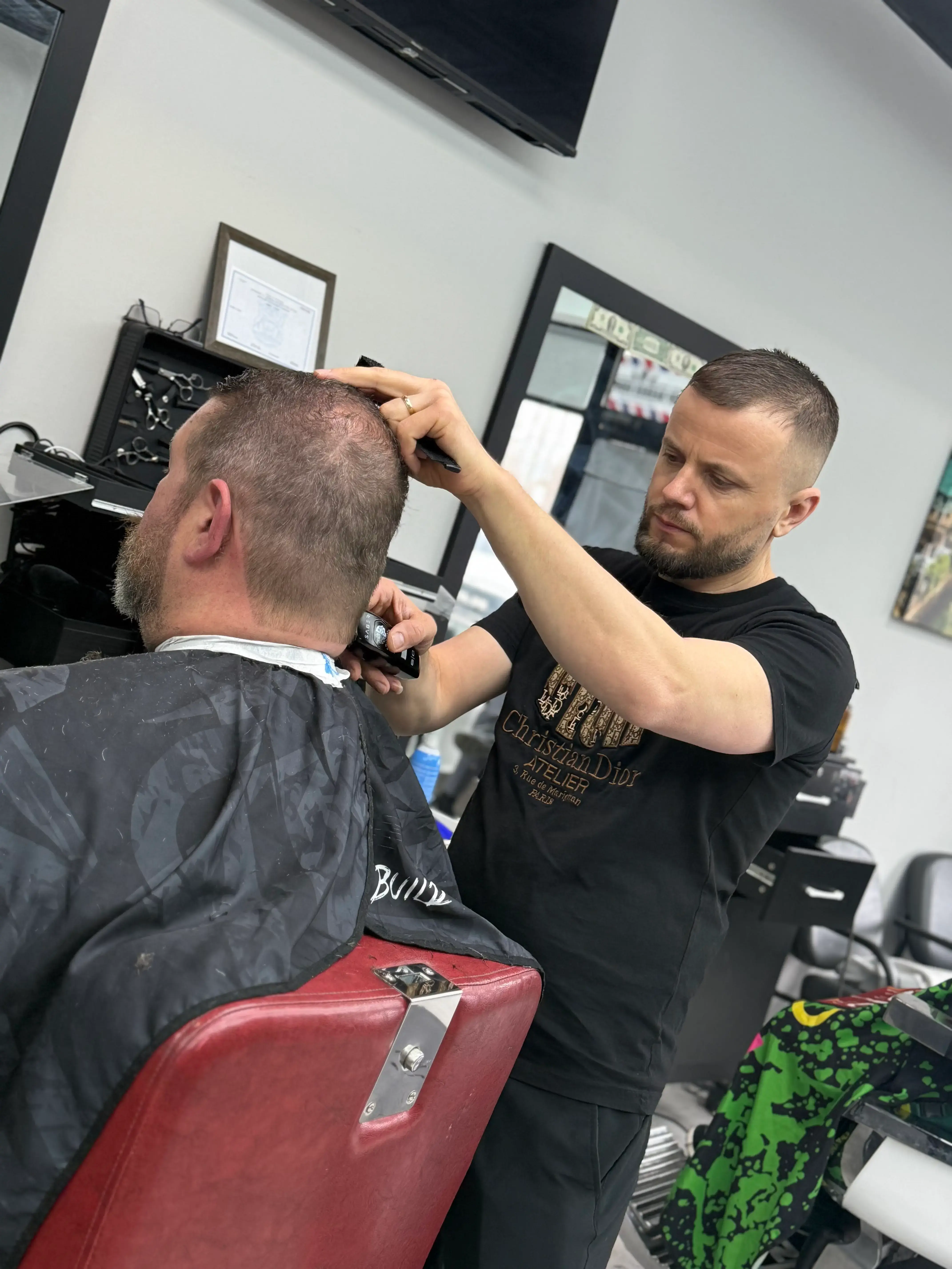 Professional portrait of Nick Pisha, Barber at EuroStyles Barbershop in Michigan