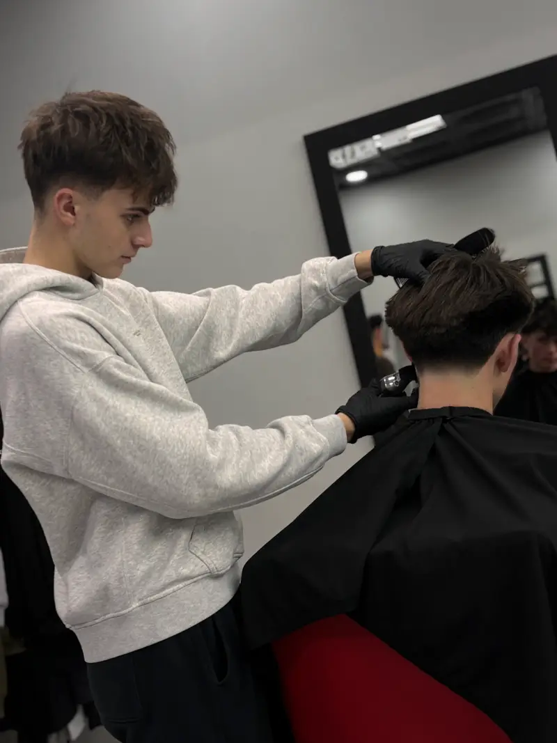 Professional portrait of Kevin Lila, Barber at Euro Styles Barbershop in Michigan