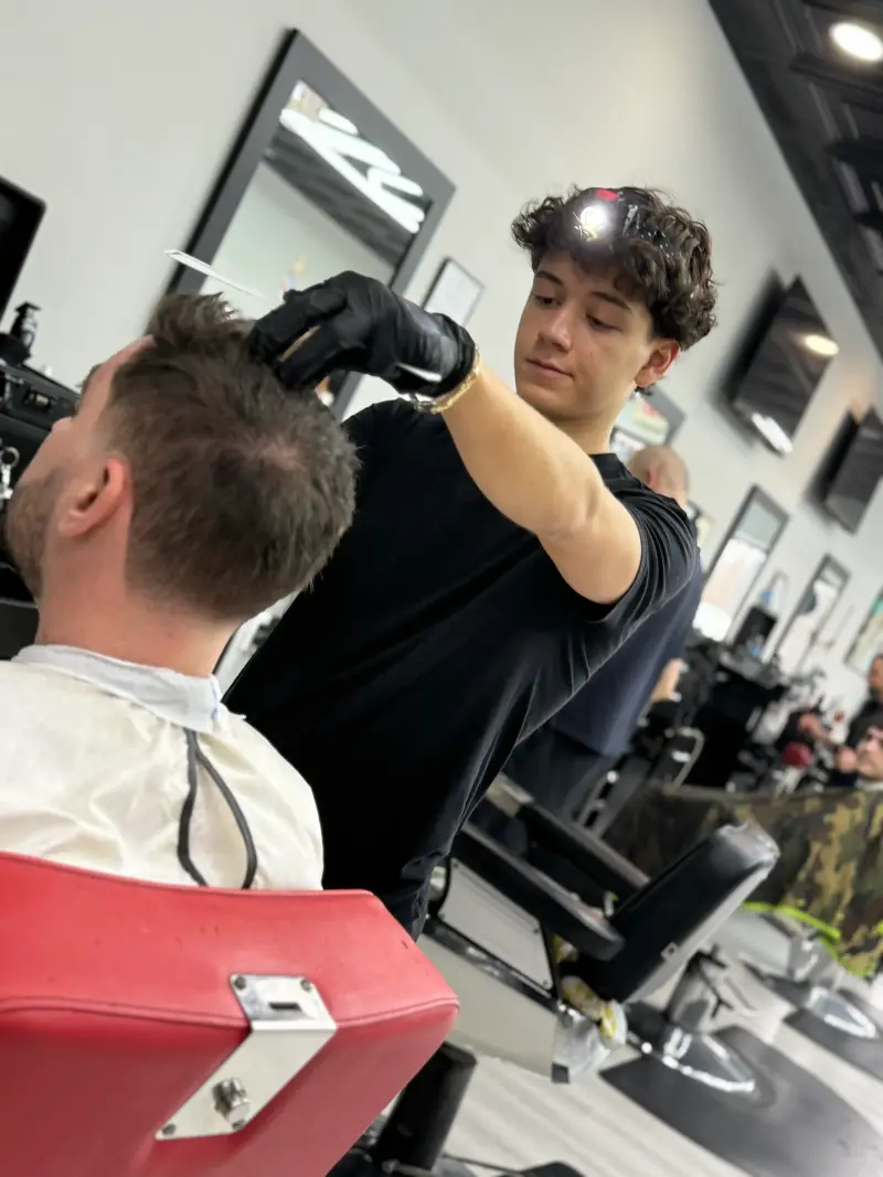 Professional portrait of Nik Stanaj, Barber at Euro Styles Barbershop in Michigan