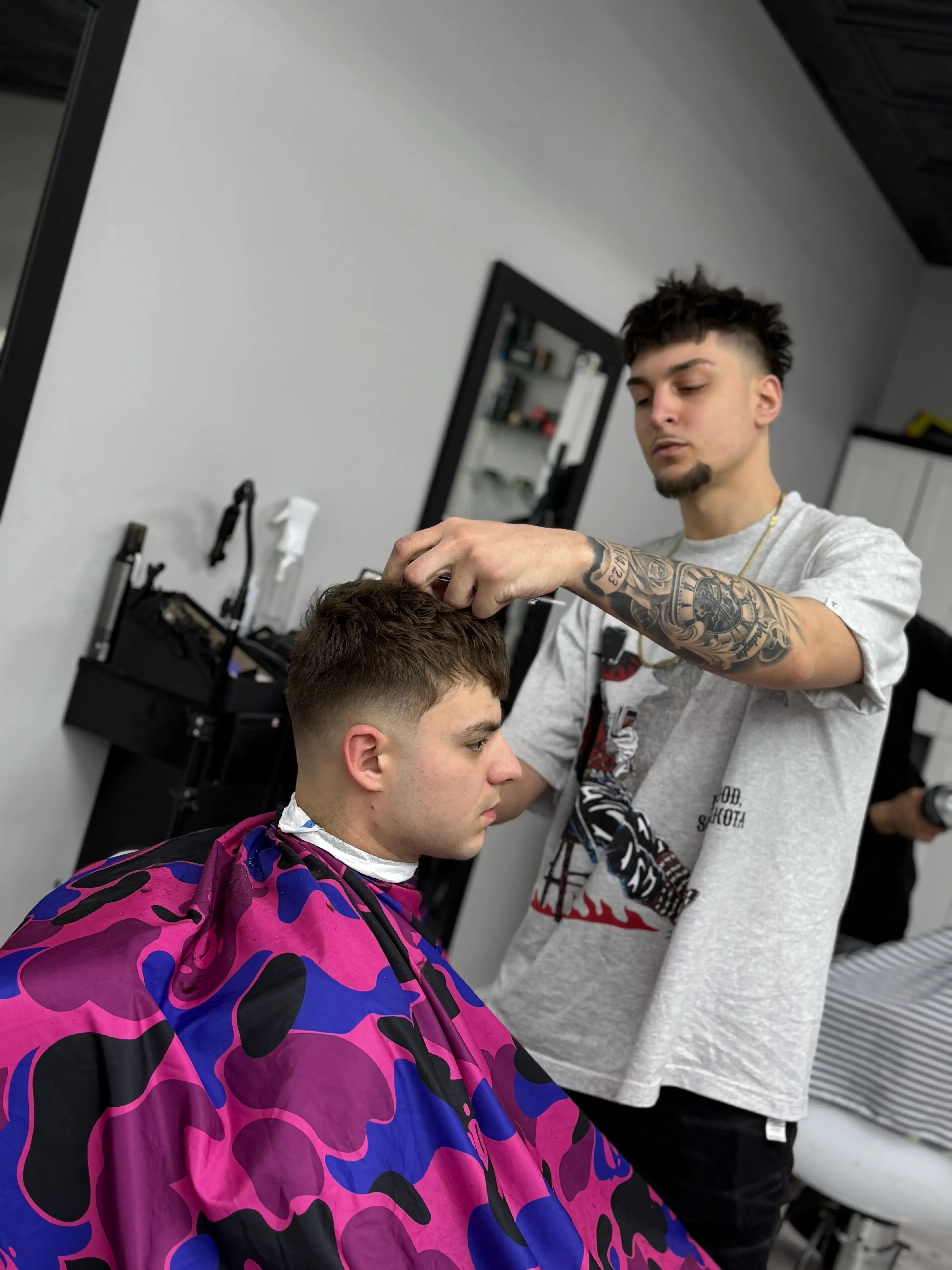 Professional portrait of Vel, Barber at EuroStyles Barbershop in Michigan